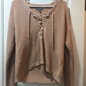 Light pink v neck criss cross sweater